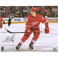 Moritz Seider Detroit Red Wings Autographed 16" x 20" Red Jersey Skating Photograph