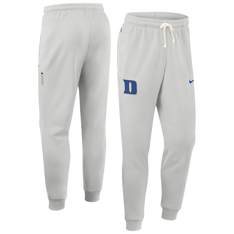Pantalon Nike Duke Blue Devils Sideline Standard Issue Dri-FIT Taper gris pour homme
