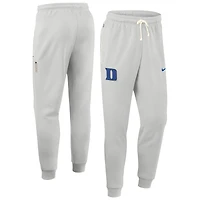 Pantalon Nike Duke Blue Devils Sideline Standard Issue Dri-FIT Taper gris pour homme