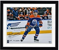 Evan Bouchard Edmonton Oilers Autographed 16" x 20" Blue Jersey Skating Photograph with "Lets Go Oilers!" Inscription