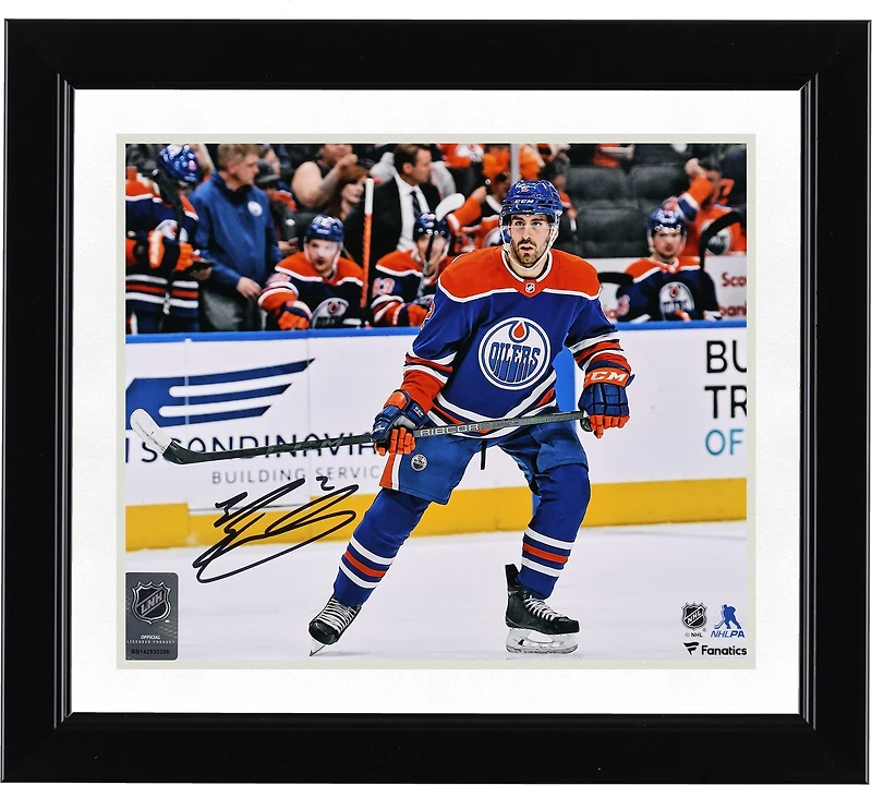 Evan Bouchard Edmonton Oilers Autographed 8" x 10" Blue Jersey Skating Photograph