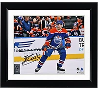 Evan Bouchard Edmonton Oilers Autographed 8" x 10" Blue Jersey Skating Photograph
