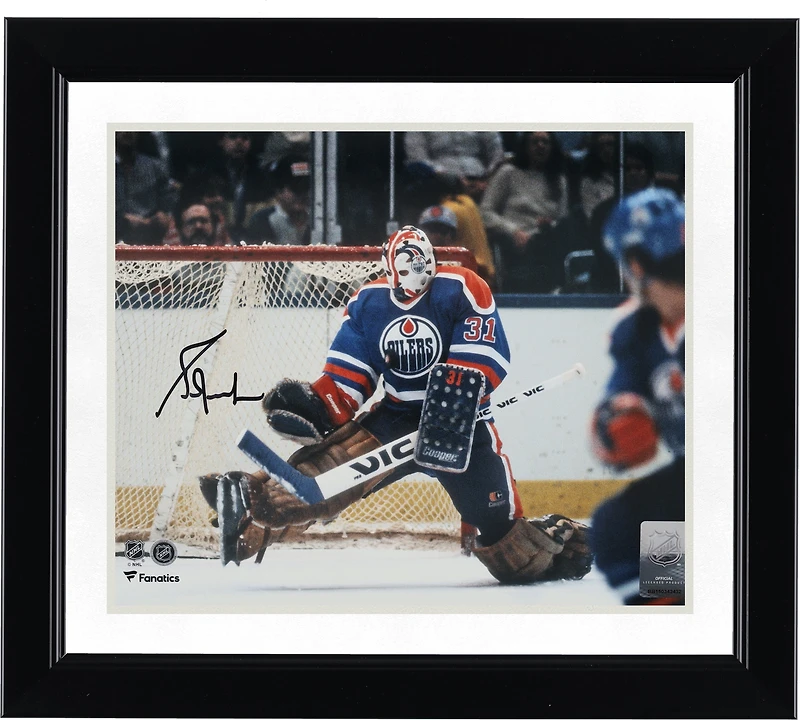 Grant Fuhr Edmonton Oilers Autographed 8" x 10" Royal Jersey Making Save Photograph