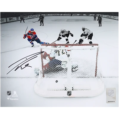 Photographie autographiée de Leon Draisaitl, 8" x 10", des Oilers d'Edmonton, lors du premier match de la finale de la Coupe Stanley 2025, mettant en vedette le but en prolongation
