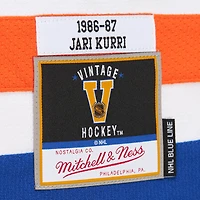 Maillot de joueur ligne bleue Mitchell & Ness Jari Kurri blanc des Oilers d'Edmonton 1986-87 pour hommes