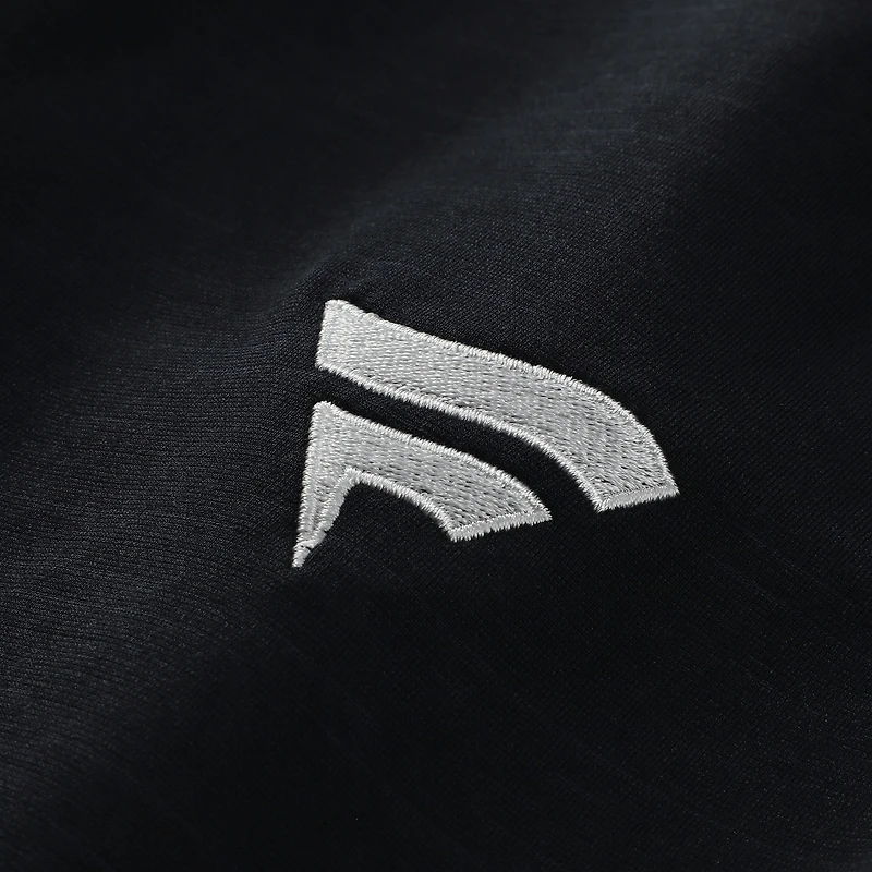 Men's TravisMathew  Black Fanatics Corporate The Heater Tri-Blend Polo