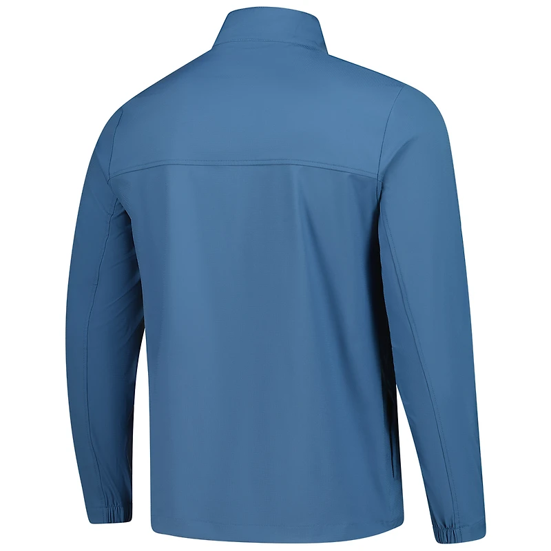 Haut zippé quart de tour TravisMathew Blue Fanatics Corporate Wanderlust pour homme