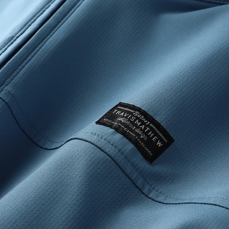 Haut zippé quart de tour TravisMathew Blue Fanatics Corporate Wanderlust pour homme