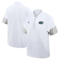 Veste d'entraîneur Jordan Brand blanche Florida Gators 2025 Sideline à manches courtes et fermeture éclair quart de cercle Dri-FIT pour homme