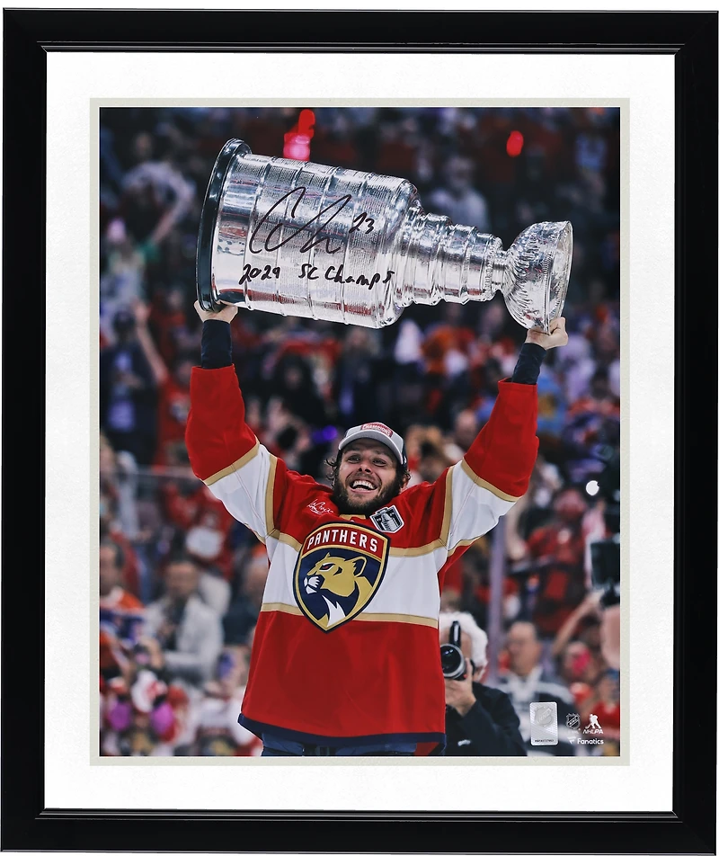 Carter Verhaeghe Florida Panthers Autographed 2024 Stanley Cup Champions 16" x 20" Raising Cup Photograph with "2024 SC Champs" Inscription