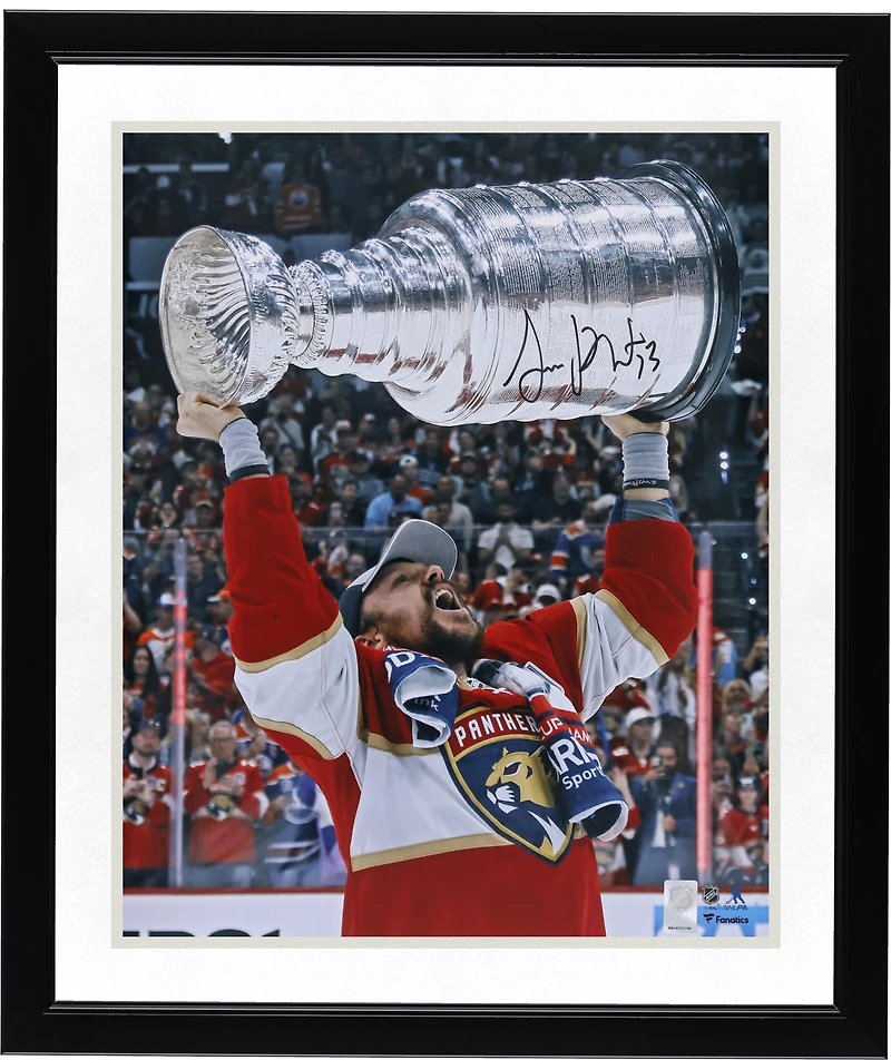 Sam Reinhart Florida Panthers Autographed 2024 Stanley Cup Champions 16" x 20" Raising Cup Photograph