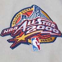 Veste Mitchell & Ness Thunderstorm légère en satin bleu/argent pour homme, modèle Golden State Warriors. Fermeture à boutons-pression.