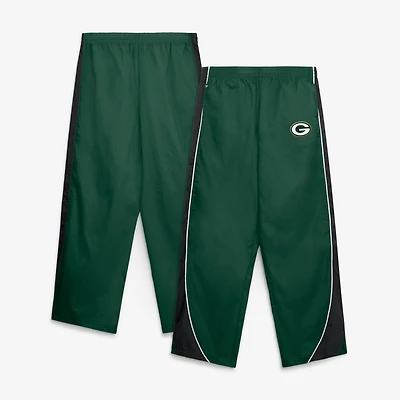 Pantalon en nylon Fanatics vert/noir pour femmes, Green Bay Packers, Team First, à revers et empiècements latéraux.