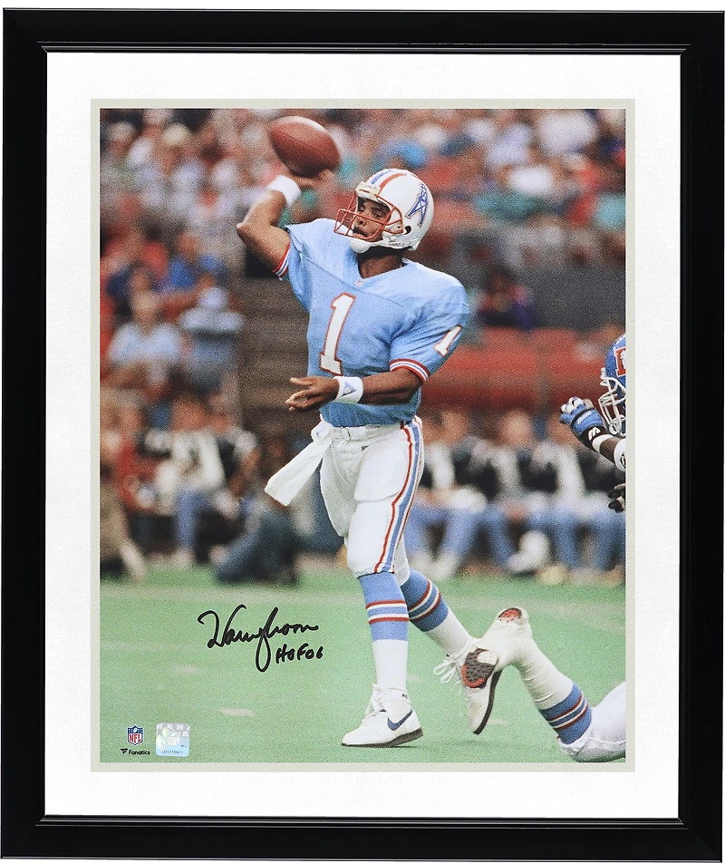 Warren Moon Houston Oilers Autographed 16" x 20" Light Blue Jersey Throwing Photograph with "HOF 06" Inscription