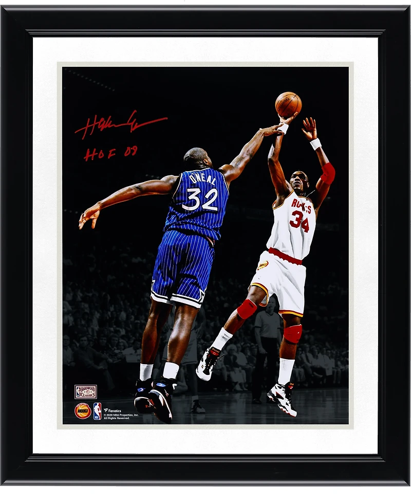 Hakeem Olajuwon Houston Rockets Autographed 11" x 14" Jump Shot Over Shaquille O'Neal Spotlight Photograph with "HOF 08" Inscription