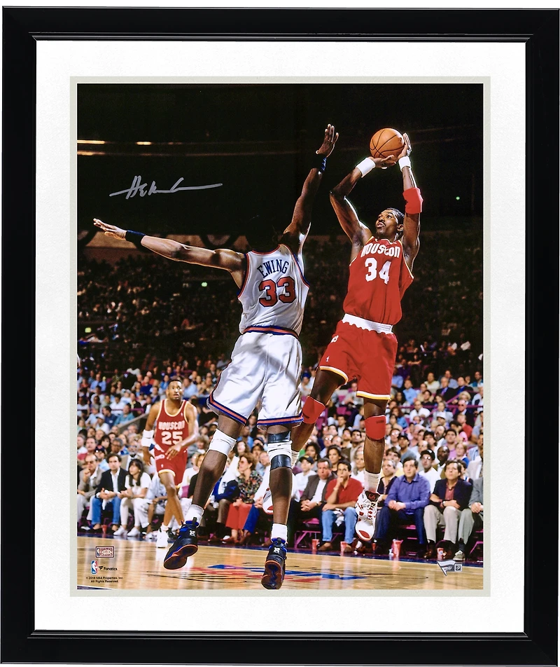 Hakeem Olajuwon Houston Rockets Autographed 16" x 20" Jumping Photograph