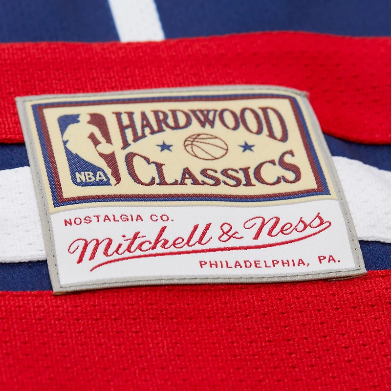 Maillot de hockey unisexe Mitchell & Ness Hakeem Olajuwon bleu marine des Houston Rockets Maxxed Out Fashion