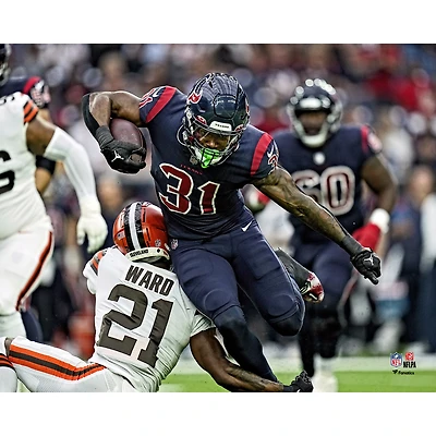 Dameon Pierce Houston Texans Unsigned Breaking a Tackle Photograph