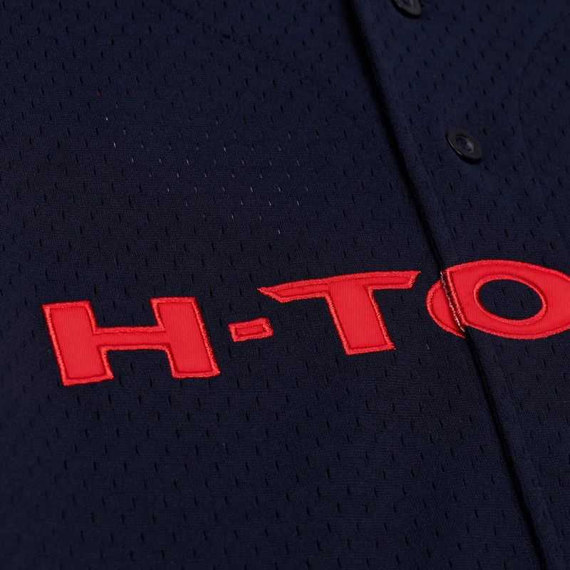 Maillot de mode Mitchell & Ness bleu marine pour homme, modèle Houston Texans Head Coach, en maille et à boutons.