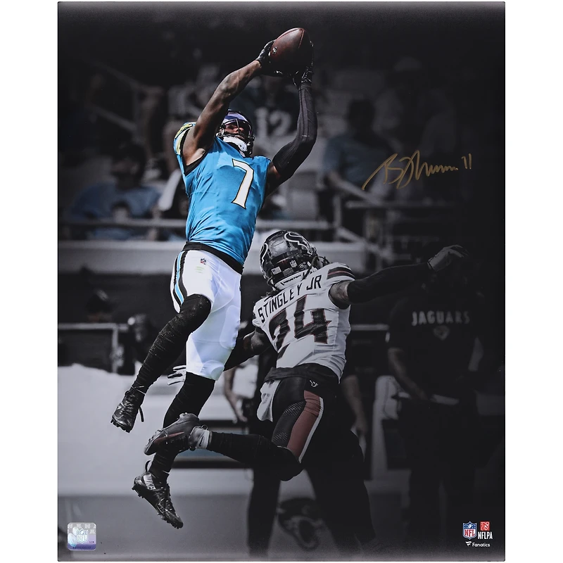 Brian Thomas Jr. Jacksonville Jaguars Autographed 16" x 20" Leaping Catch Spotlight Photograph