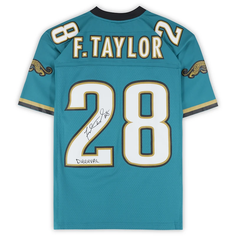 Maillot Mitchell & Ness Legacy 1998 turquoise autographié par Fred Taylor, des Jaguars de Jacksonville, avec inscription « Duuuval ».