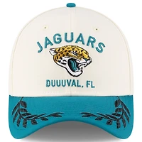 Casquette New Era 39THIRTY Flex crème/bleu sarcelle pour homme des Jaguars de Jacksonville, draft NFL 2025