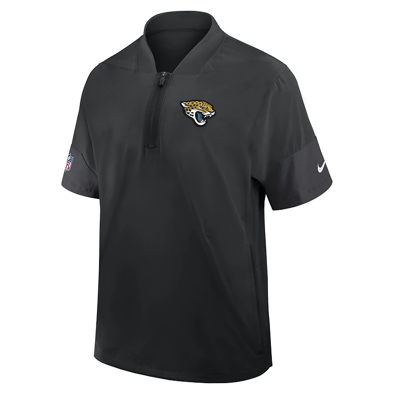 Veste d'entraîneur Nike noire Jacksonville Jaguars Sideline à manches courtes et fermeture éclair au quart pour homme, technologie Dri-FIT