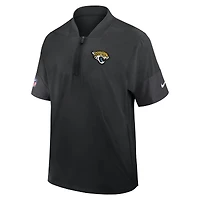Veste d'entraîneur Nike noire Jacksonville Jaguars Sideline à manches courtes et fermeture éclair au quart pour homme, technologie Dri-FIT
