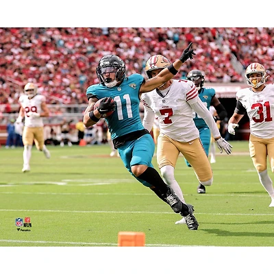 Photographie non signée de Parker Washington Jacksonville Jaguars, touché lors du retour botté dégagement la semaine 4 2025