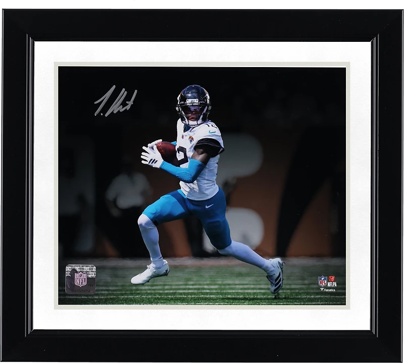 Travis Hunter Jacksonville Jaguars Autographed 8" x 10" White Jersey Running Spotlight Photograph