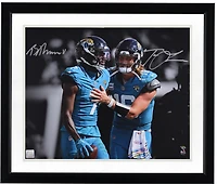 Trevor Lawrence & Brian Thomas Jr. Jacksonville Jaguars Autographed 16" x 20" Teal Jersey Spotlight Photograph