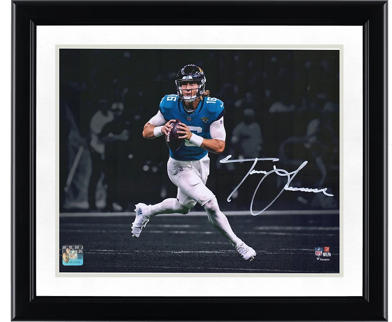 Trevor Lawrence Jacksonville Jaguars Autographed 11" x 14" Spotlight Roll Out Photograph