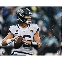 Trevor Lawrence Jacksonville Jaguars Autographed 16" x 20" In the Rain Photograph