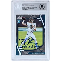 Carte de recrue autographiée de Trevor Lawrence (Jaguars de Jacksonville) Panini Absolute 2021 n° 101, authentifiée par Beckett Fanatics Witnessed, avec inscription « Choix n° 1 de la saison 2021 ».