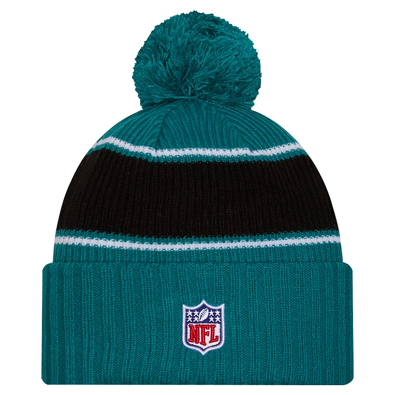 Youth New Era Teal Jacksonville Jaguars 2024/25 Sideline Cuffed Knit Hat with Pom