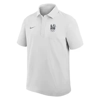 Polo tissé Nike blanc LA28 à rayures rétro pour homme, motif Jeux olympiques d'été