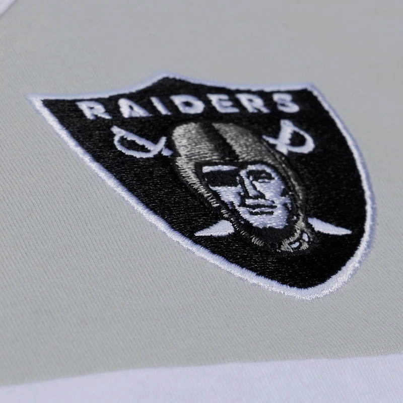 Débardeur Mitchell & Ness noir et argent pour homme, modèle entraîneur-chef des Raiders de Las Vegas