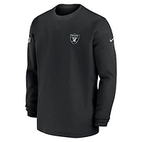 Haut à manches longues Nike noir Las Vegas Raiders 2023 Sideline Throwback Heavy Brushed Waffle pour homme