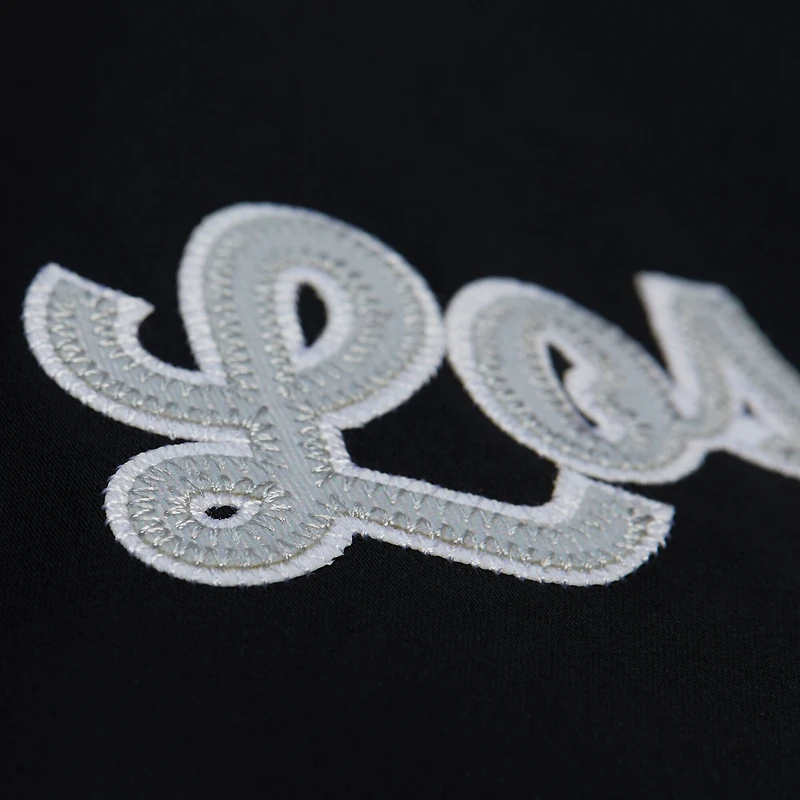 Veste en satin noire à boutons-pression pour femme Mitchell & Ness des Las Vegas Raiders