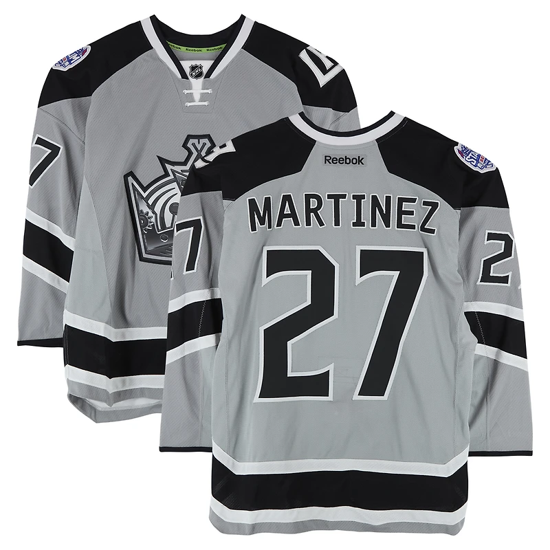 Maillot argenté Reebok n° 27 porté par Alec Martinez lors de l'entraînement des Kings de Los Angeles contre les Ducks d'Anaheim le 25 janvier 2014 - Série des stades de la LNH - Porté pendant l'échauffement