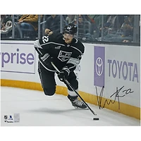 Kevin Fiala Los Angeles Kings Autographed 16" x 20" Black Jersey with Puck Photograph