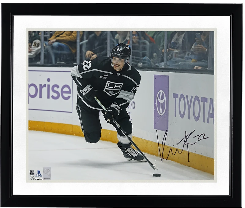 Kevin Fiala Los Angeles Kings Autographed 16" x 20" Black Jersey with Puck Photograph