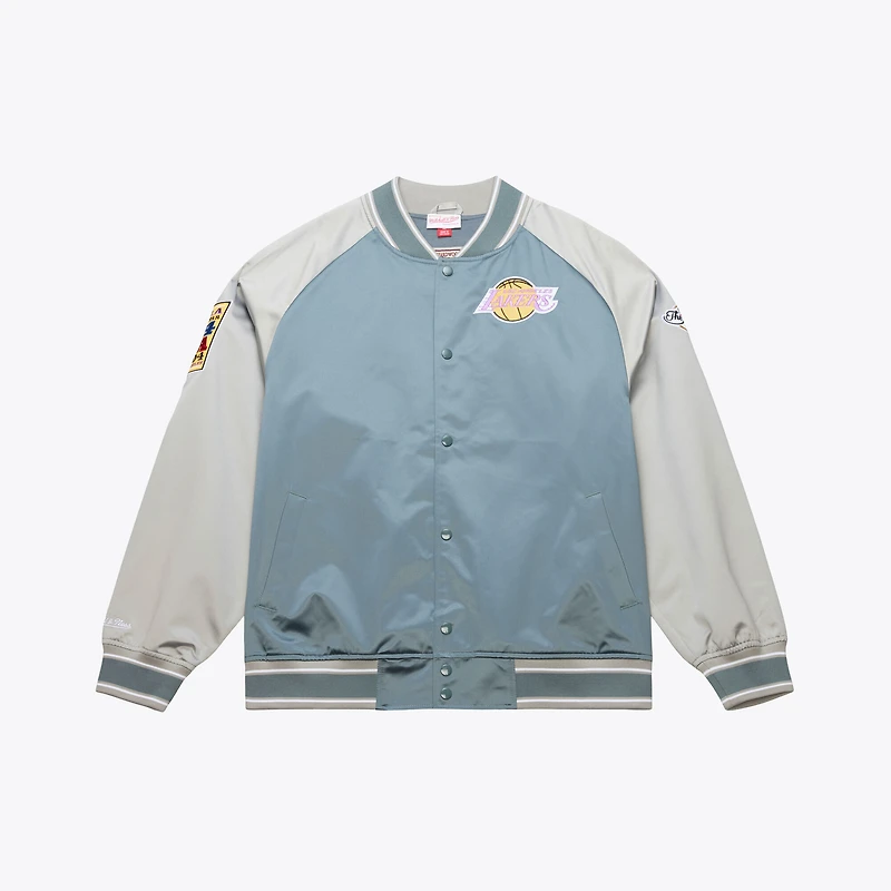 Veste Mitchell & Ness Thunderstorm légère en satin bleu/argent pour homme, Los Angeles Lakers, fermeture à boutons-pression.