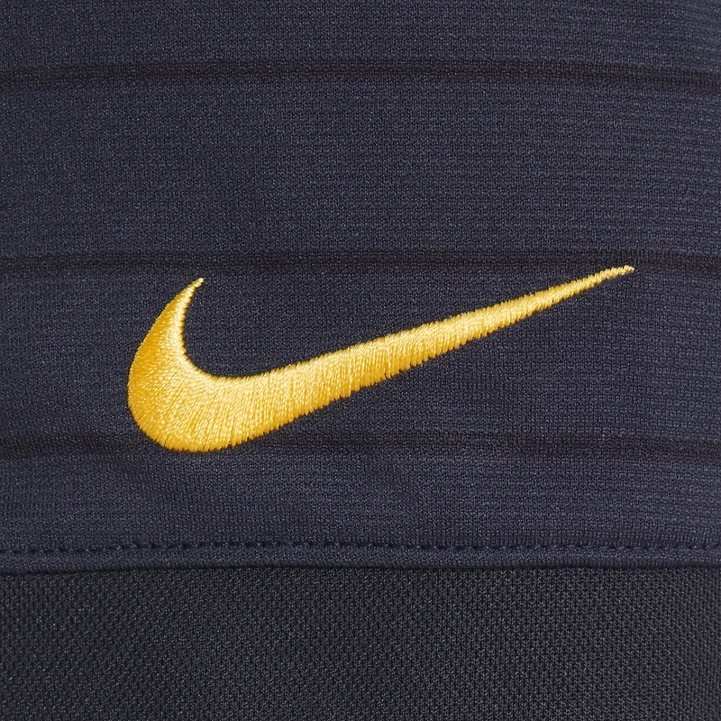 Polo Nike Dri-FIT bleu nuit pour homme, collection Rivalités 2025, Los Angeles Rams, à rayures sur le côté