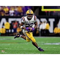 Clyde Edwards-Helaire LSU Tigers Unsigned White Jersey Running Photograph