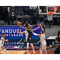 Photographie de Ja Morant des Memphis Grizzlies non signés en route pour un dunk contre les New Orleans Pelicans