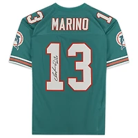 Maillot authentique Mitchell & Ness bleu turquoise autographié par Dan Marino des Miami Dolphins avec inscription « HOF 05 ».