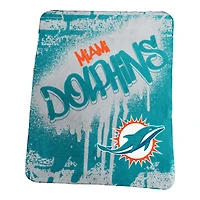 Couverture polaire classique à motif graffiti des Miami Dolphins (50 po x 60 po) avec logo de marque