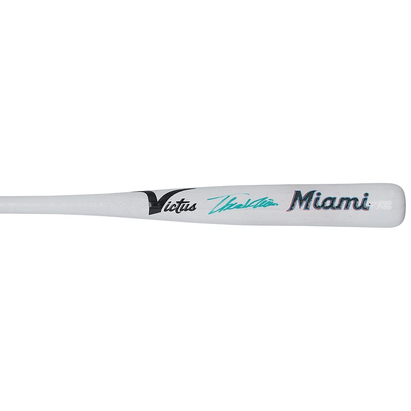 Bâton miniature Victus autographié par Thomas White des Marlins de Miami