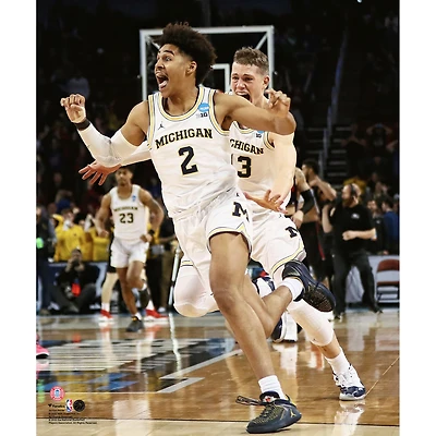 Jordan Poole, joueur non signé des Michigan Wolverines, célèbre la victoire au buzzer lors du deuxième tour tournoi de basketball masculin NCAA 2018 (photo)